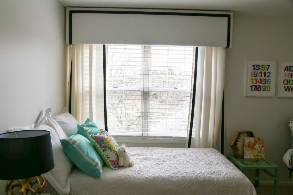 diy valance box with white curtains and black ribbon with bed in front of window