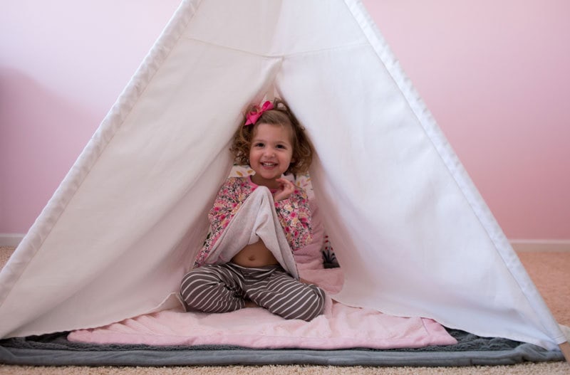 girl in a teepee