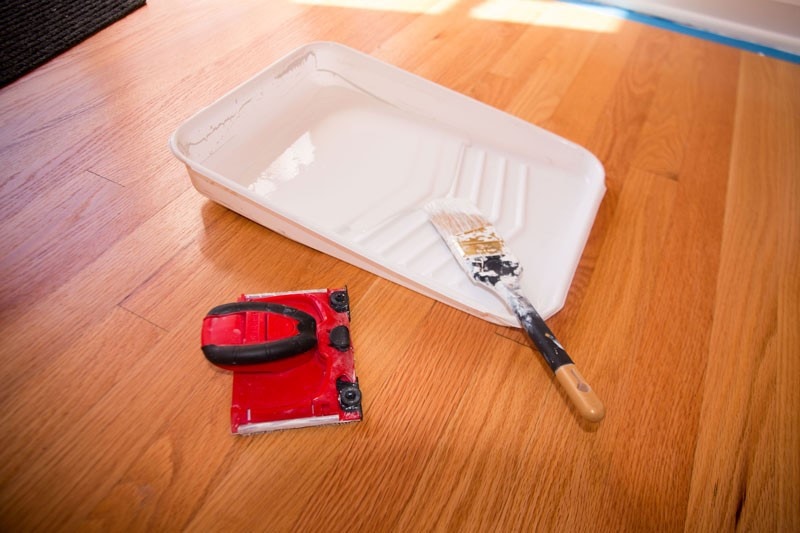 paint wood trim supplies with a paint tray paint brush and paint edger