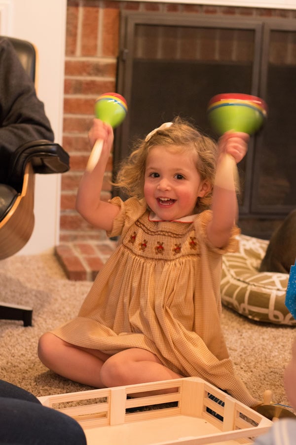 2 year old girl playing musical instruments- best toys for 2 year old girls