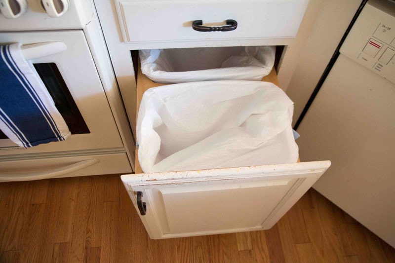 clean garbage cans- part of spring cleaning checklist