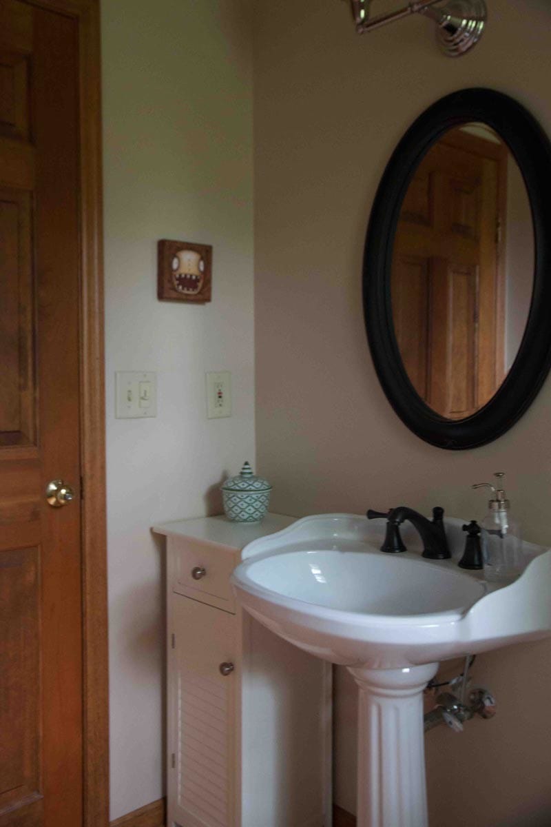 brown bathroom with wood trim - blue and white bathroom before shot