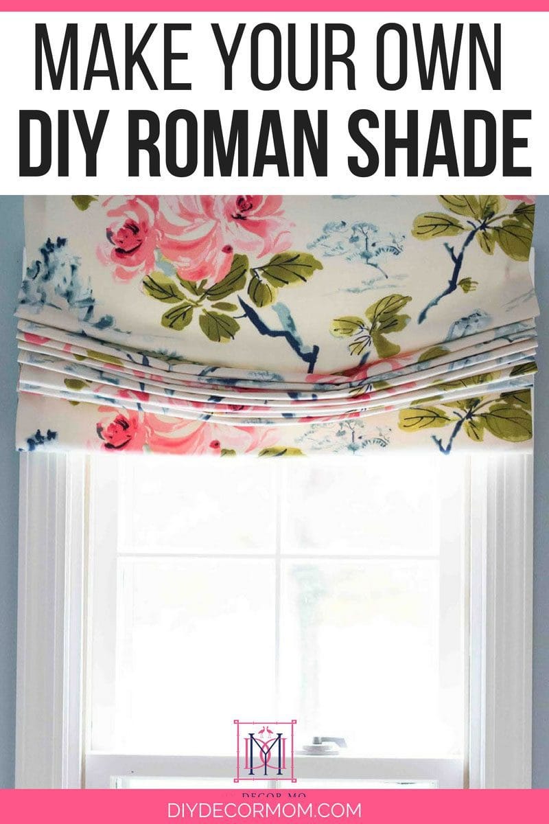 diy roman shade tutorial of relaxed roman shade with flowery fabric on window in bathroom