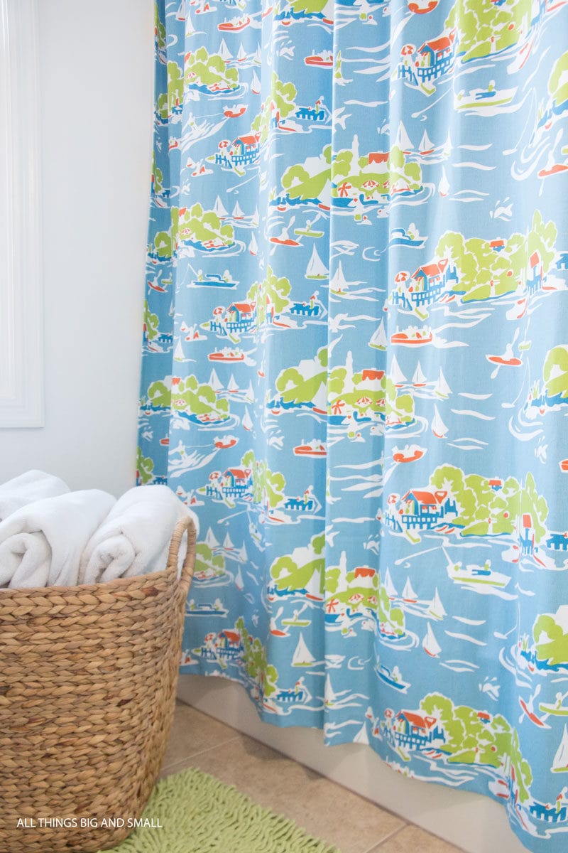 kids bathroom shower curtain nautical theme with woven basket holding towels