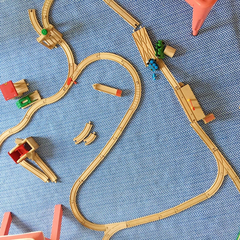 train tracks on playroom floor rug