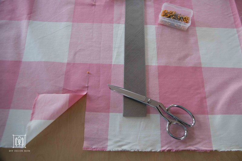 fabric for baby crib skirt | pink buffalo check fabric | DIY crib skirt pattern with scissors and pins by home blogger DIY Decor Mom