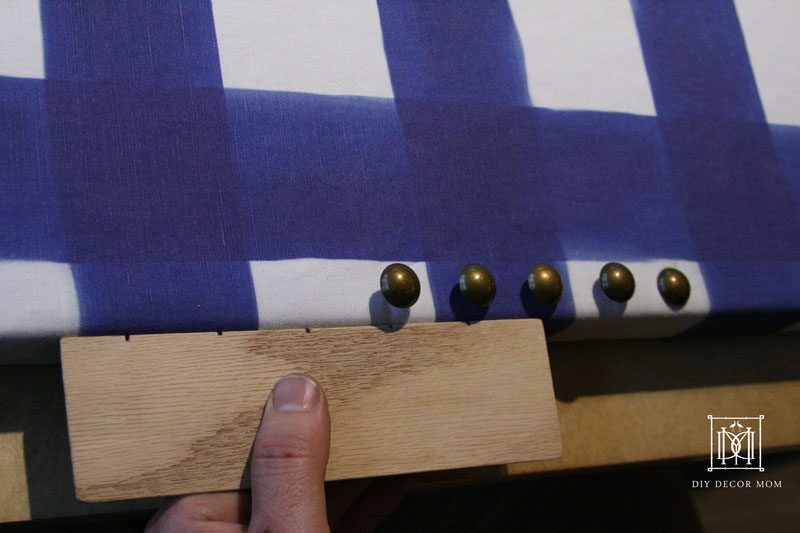 measuing nailhead trim for DIY fabric covered bulletin board