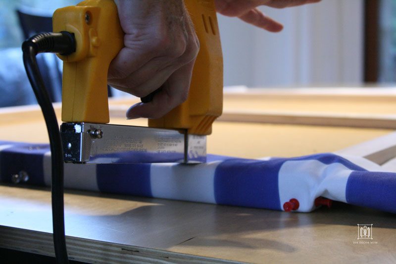 Stapling fabric for fabric covered bulletin cork board