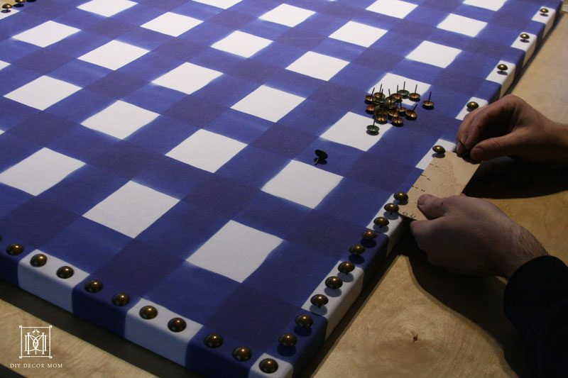 Nailhead trim for fabric bulletin board