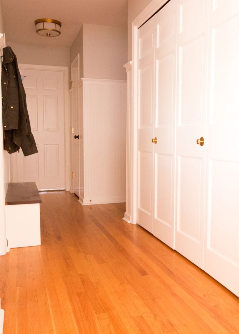 mudroom coat hooks with small mudroom bench and beadboard