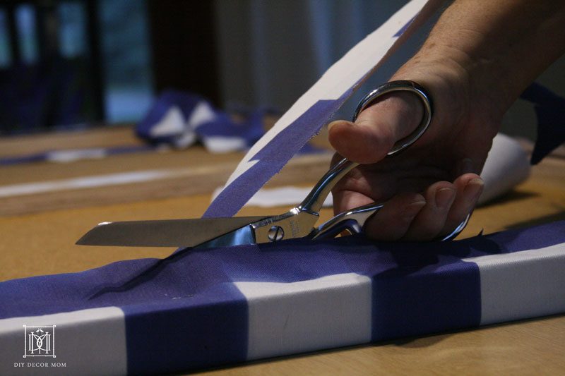 making DIY bulletin board fabric covered