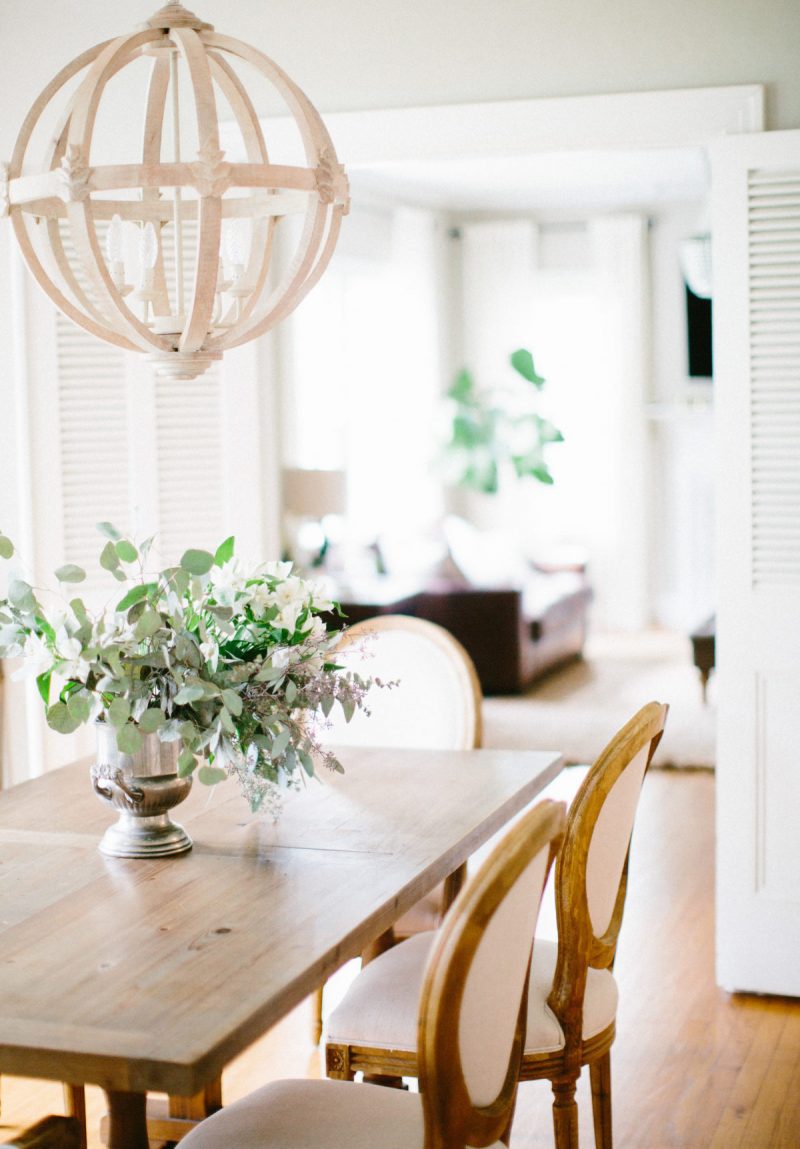 how to design a home with kids- farmhouse table and chairs wooden bead chandelier