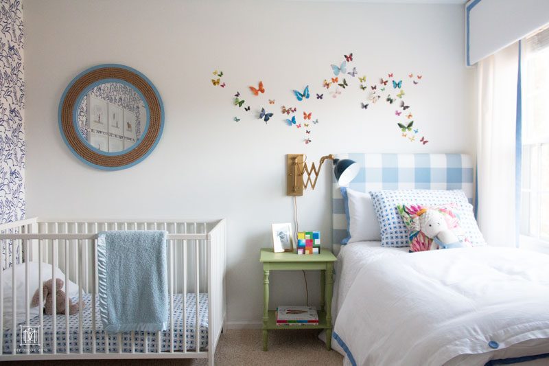 nursery decor boy- blue buffalo check headboard, french blue accents and crib in boy nursery