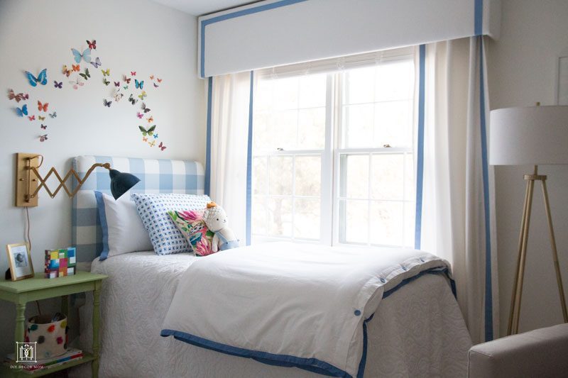 Window Valance Box with white DIY Curtains in front of white bed in boy nursery