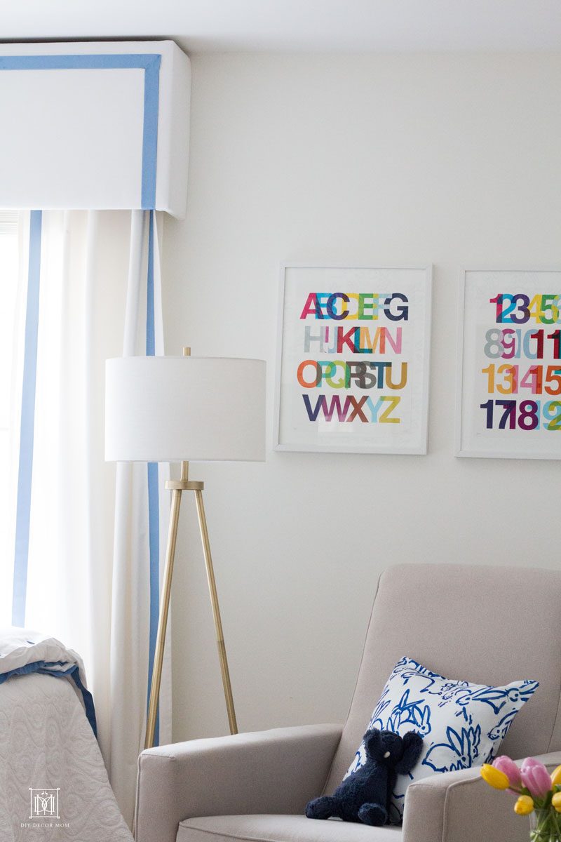 White Cornice Board Window Valance Box with blue grosgrain ribbon and white walls in baby boy bedroom