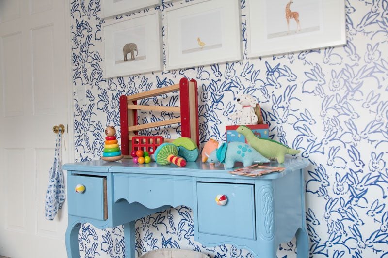 blue and white wallpaper in baby boy nursery