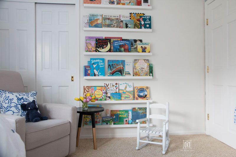 white wall nursery with DIY bookcase DIY bookledge with chair and rocking chair