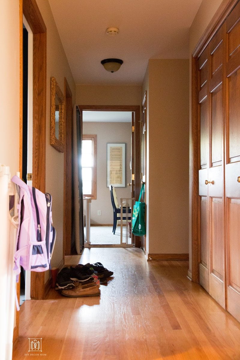 dark narrow hallway mudroom before