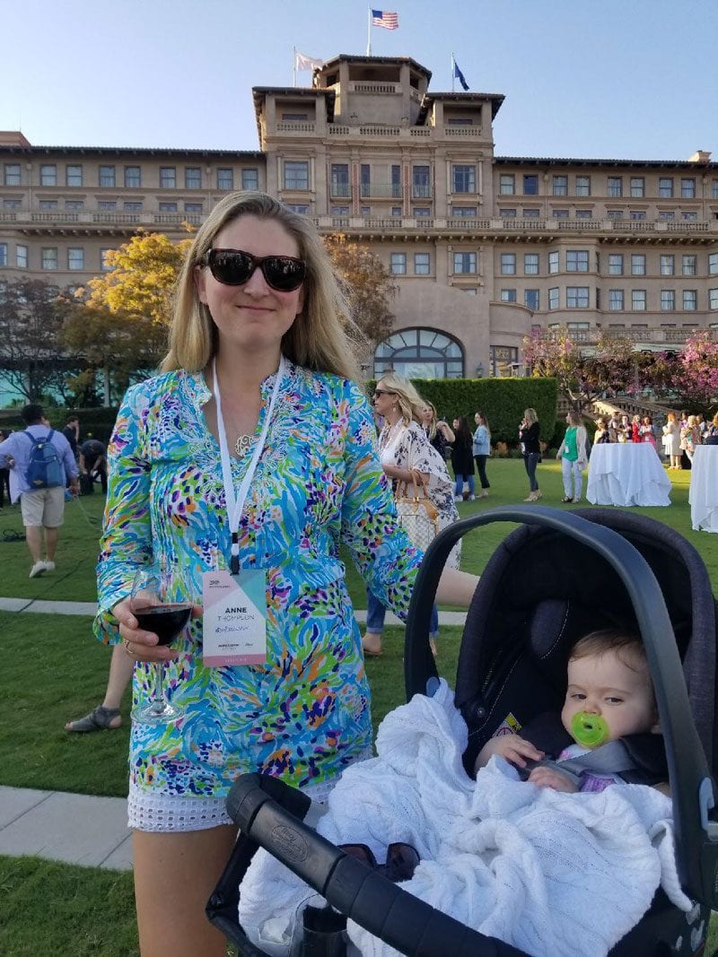 mom and baby traveling with stroller at fancy hotel