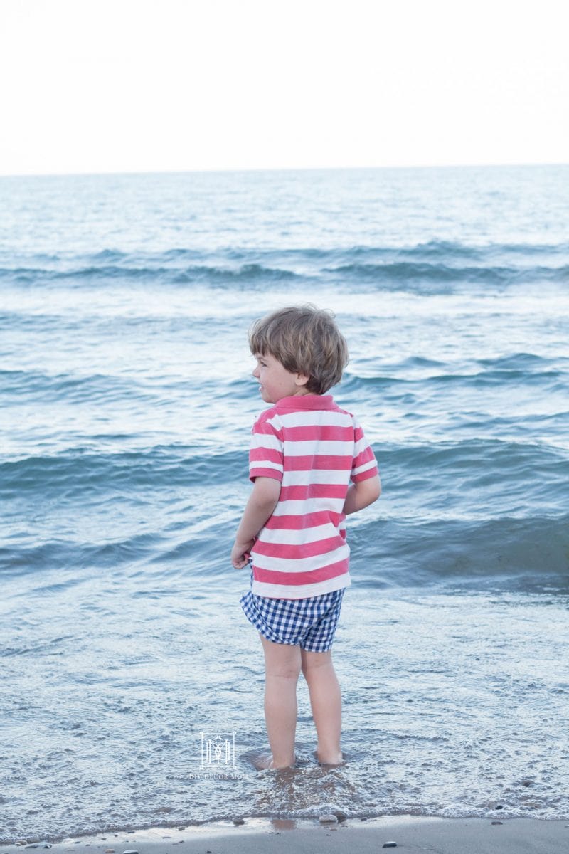 boy in the water at the beach
