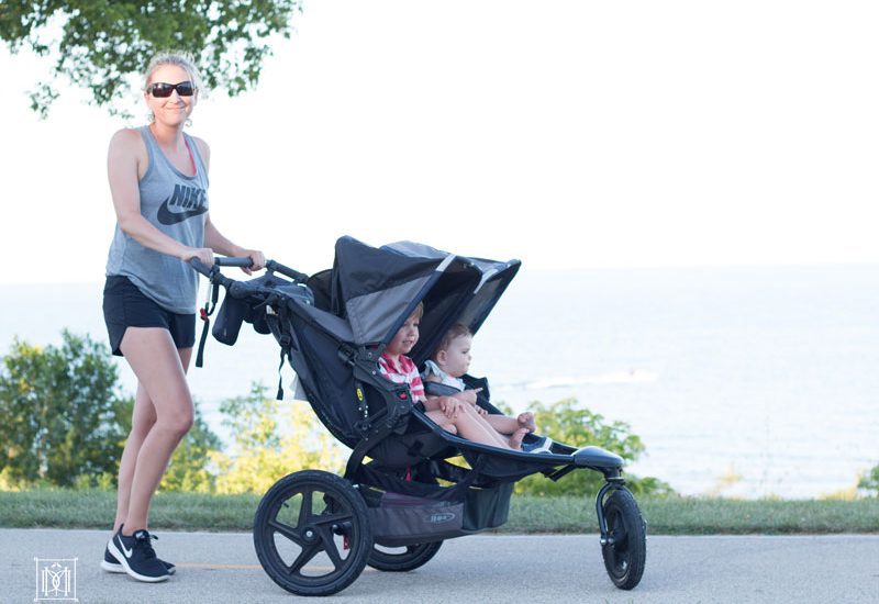 mom running with double jogging stroller= best double jogging stroller reviews