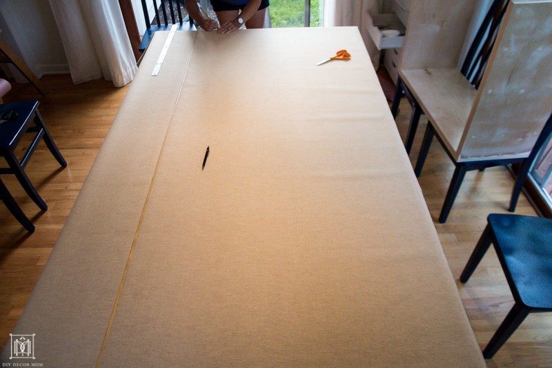 cut faux ostrich vinyl fabric on table