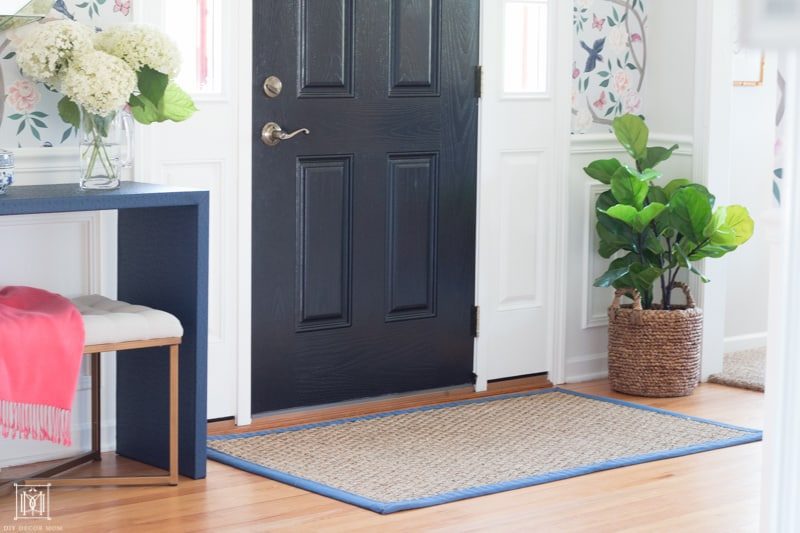 diy console table wrapped in blue fabric in entryway