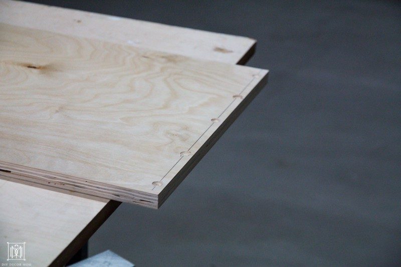 drilled holes in plywood for diy table