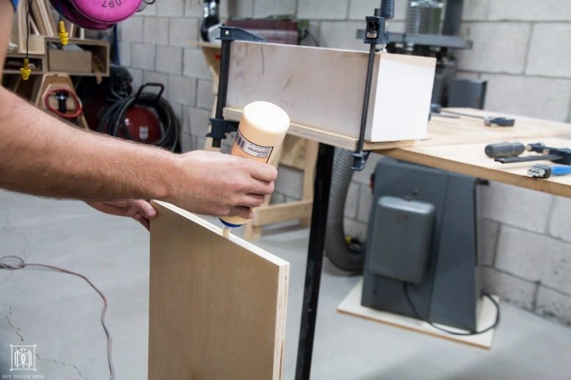 gluing pieces of plywood together for diy table