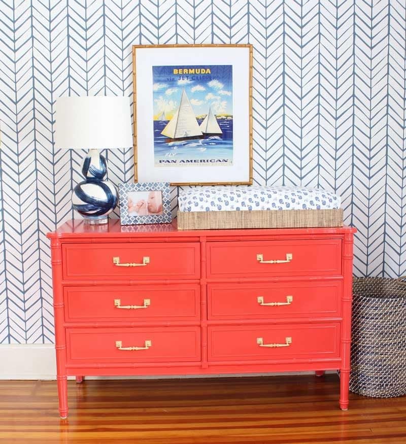 faux bamboo red dresser changing table and serena and lily wallpaper in nautical baby boy nursery- great nursery ideas from kate smith interiors