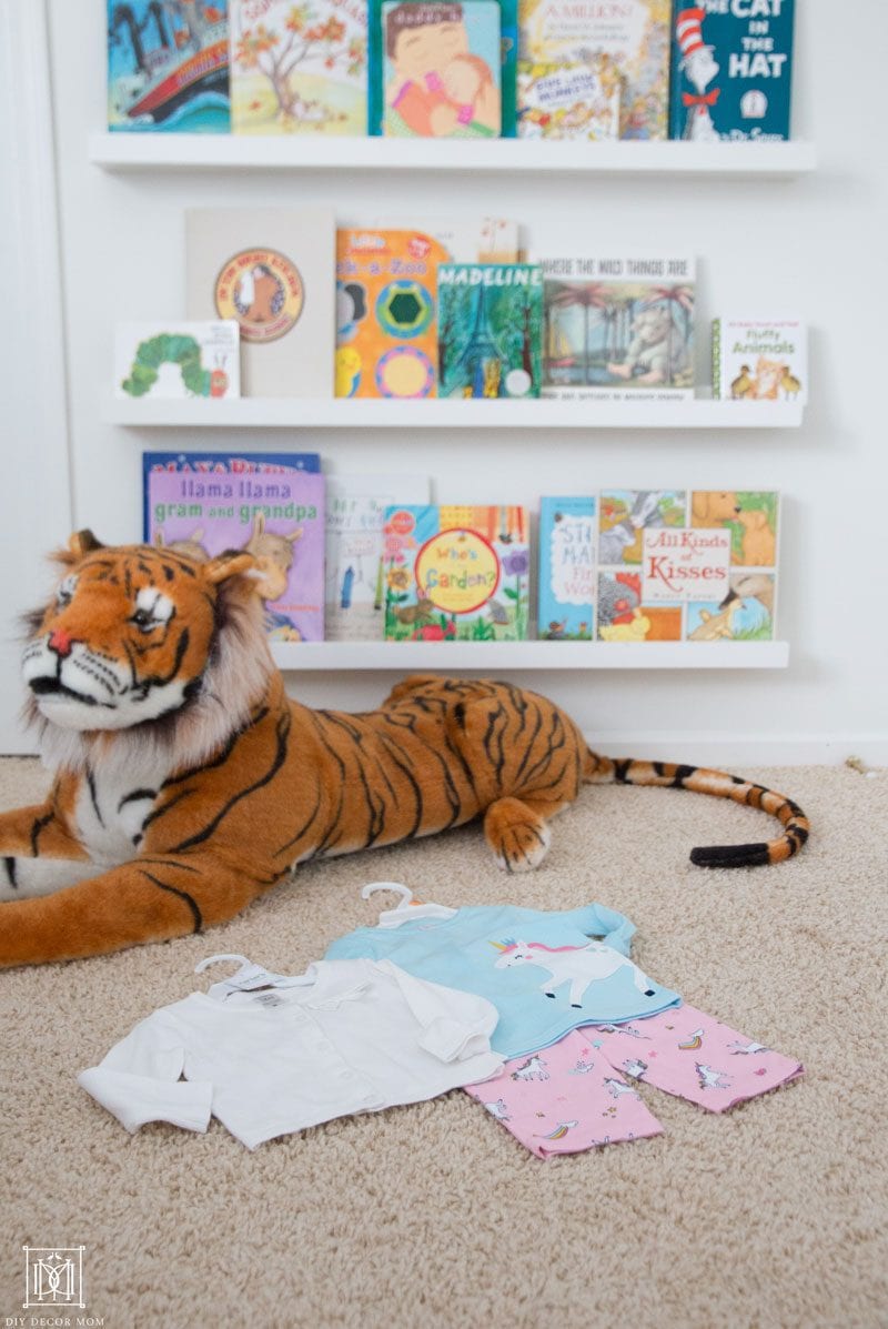 stuffed animal tiger and baby clothes from meijer- what second time moms need