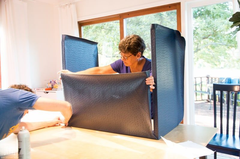 plywood waterfall table wrapped in fabric