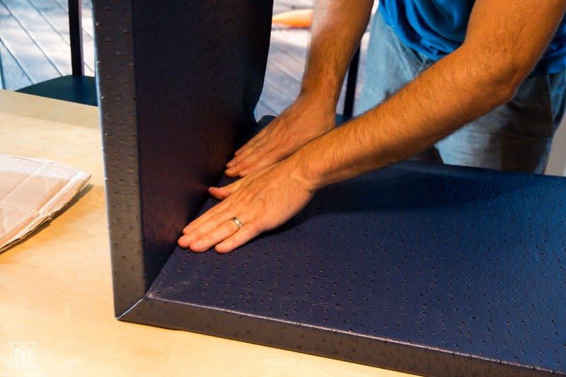 securing the fabric to the bottom of a plywood do it yourself console table