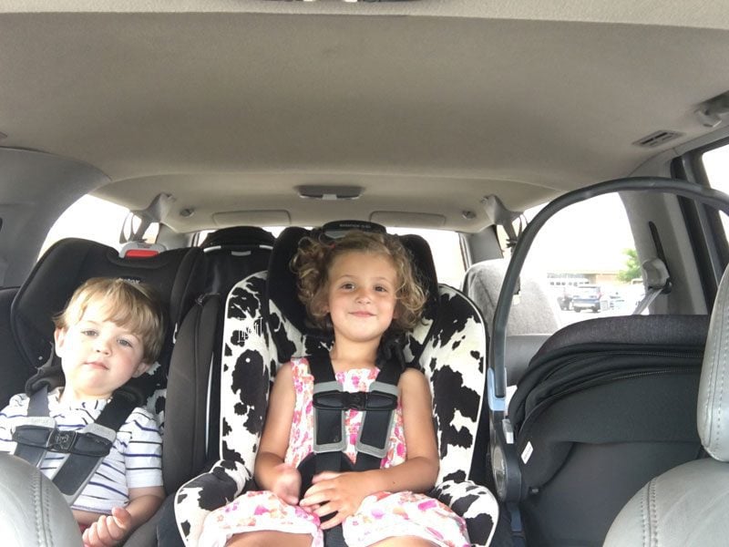 three kids in car seats- baby essentials for second time moms
