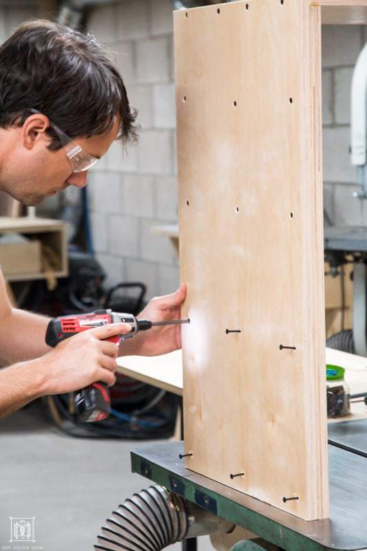 use screws to combine two pieces of plywood to make a plywood console table