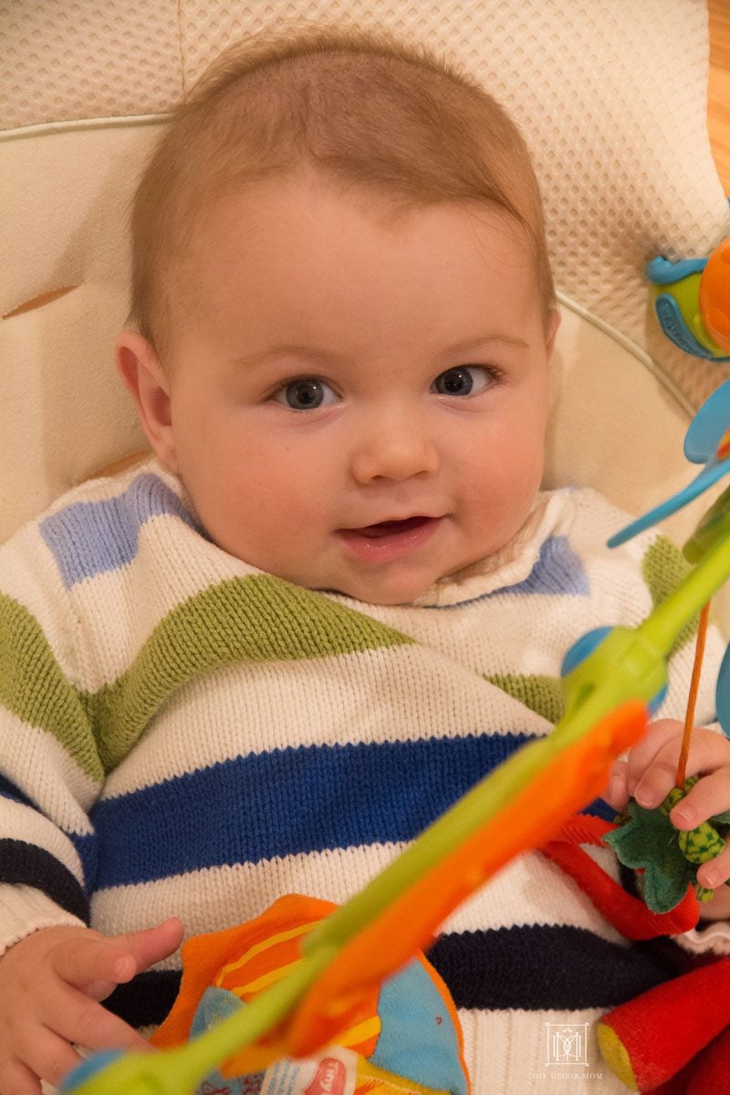 second baby in bouncer- baby essentials every mom needs