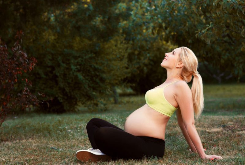 pregnant woman exercising- things to do during second trimester