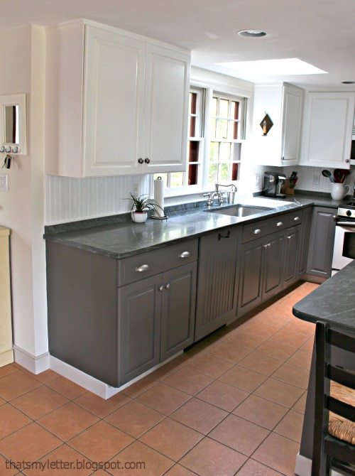 Gray and white painted kitchen cabinets by jaime costiglio painted in benjamin moore cabinet paint