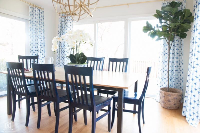 kitchen table in breakfast room with blue dining room chairs