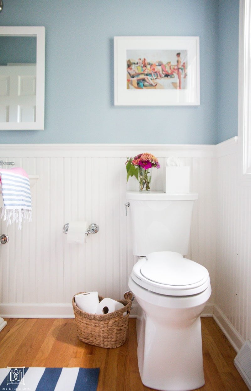 small toilet with elongated bowl that makes bathroom seem larger