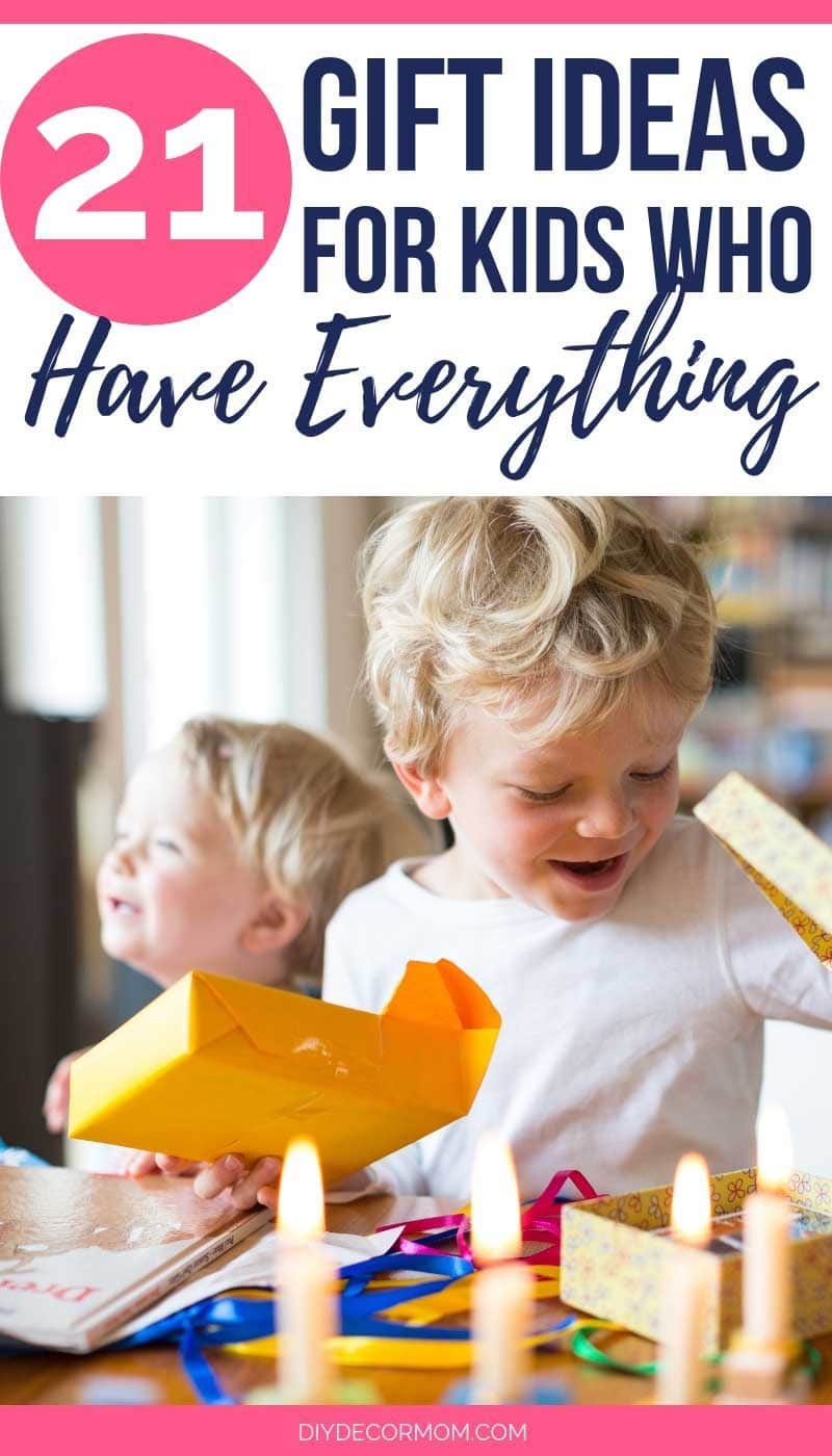 little boy opening gifts for kids who have everything