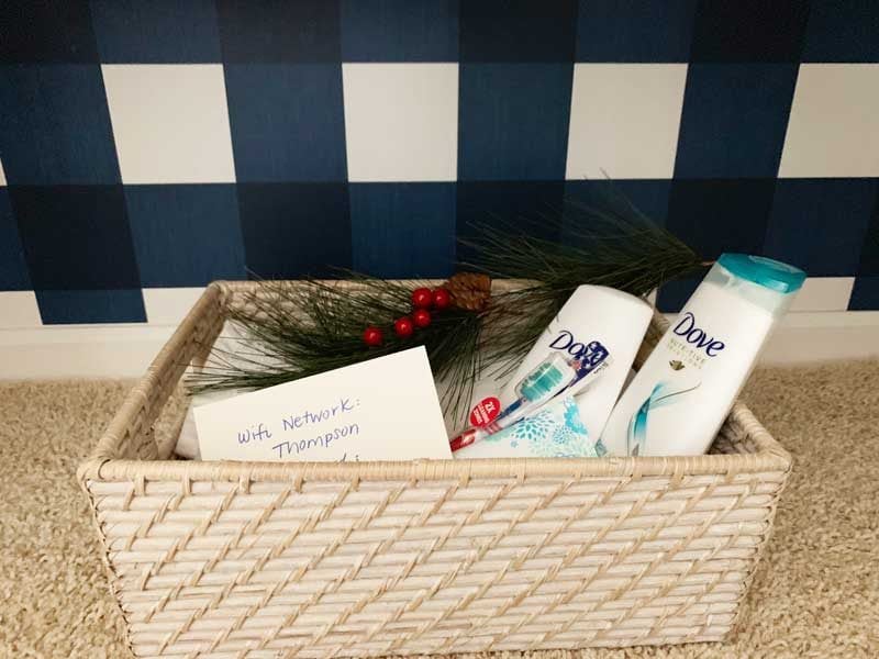 guest room welcome basket in linen closet