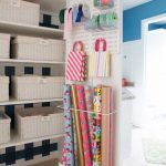 gift wrapping organizer in linen closet