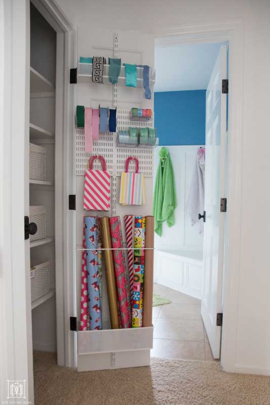 gift wrap organizer in linen closet