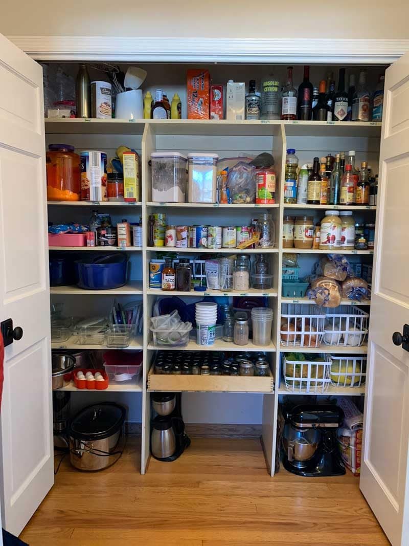 messy pantry with deep shelves