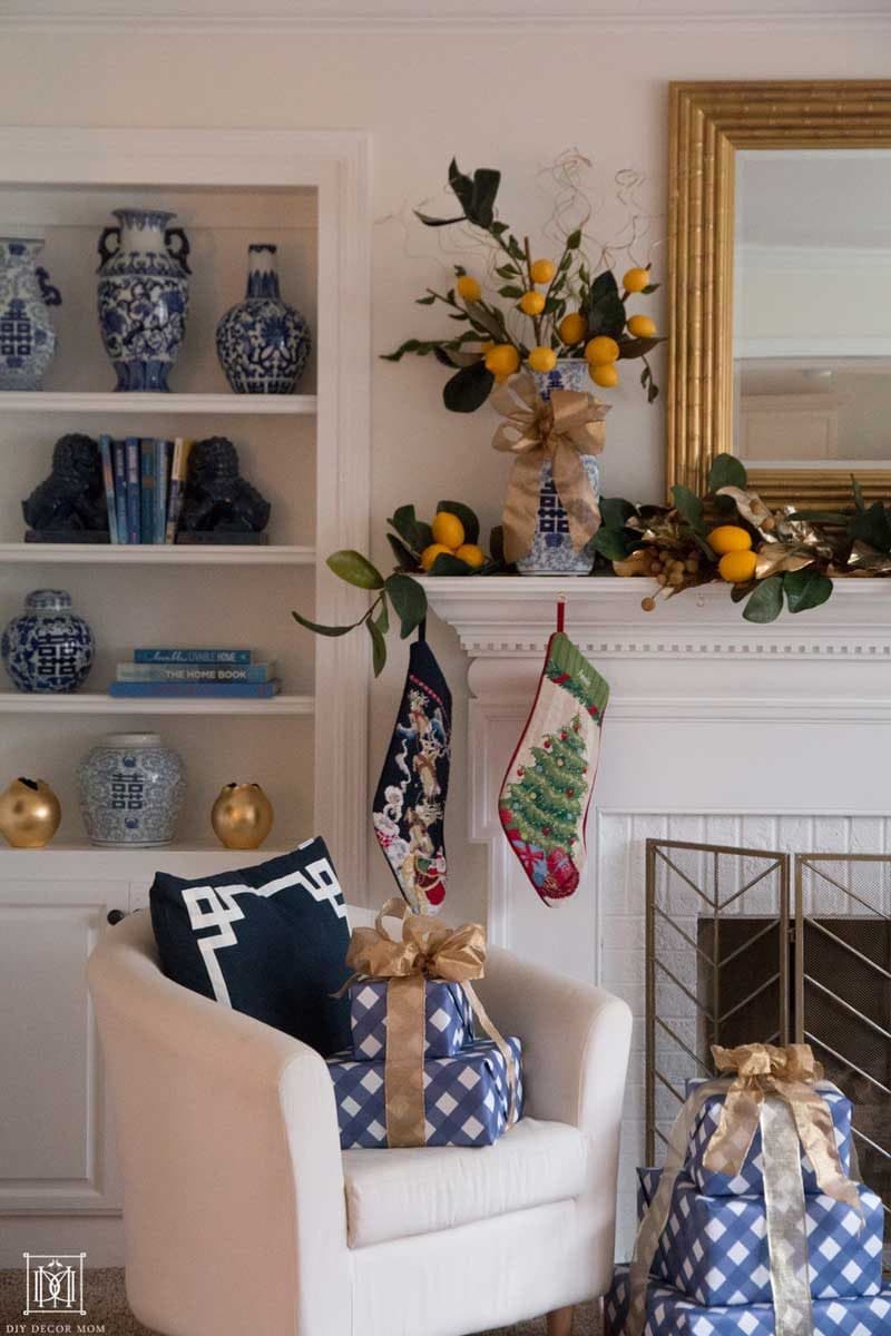 fireplace decorated with faux lemon garland