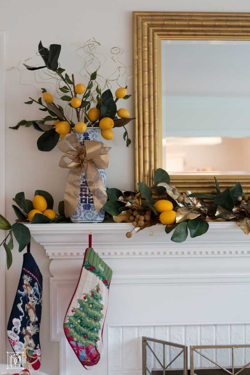 faux lemon branches in blue and white pottery with gold ribbons