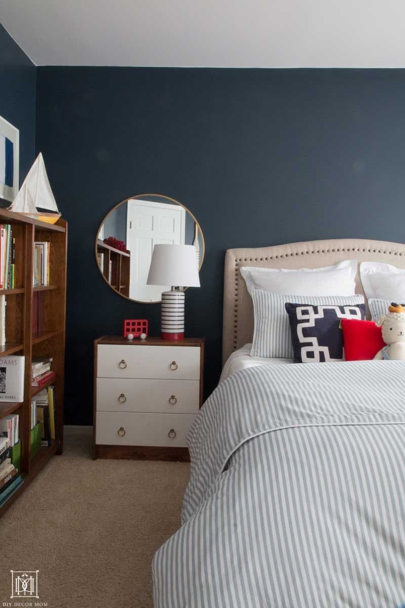 gorgeous navy blue bedroom with nautical theme perfect for little boys bedroom