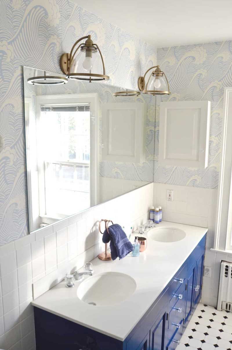 blue bathroom vanity in shared kids bathroom