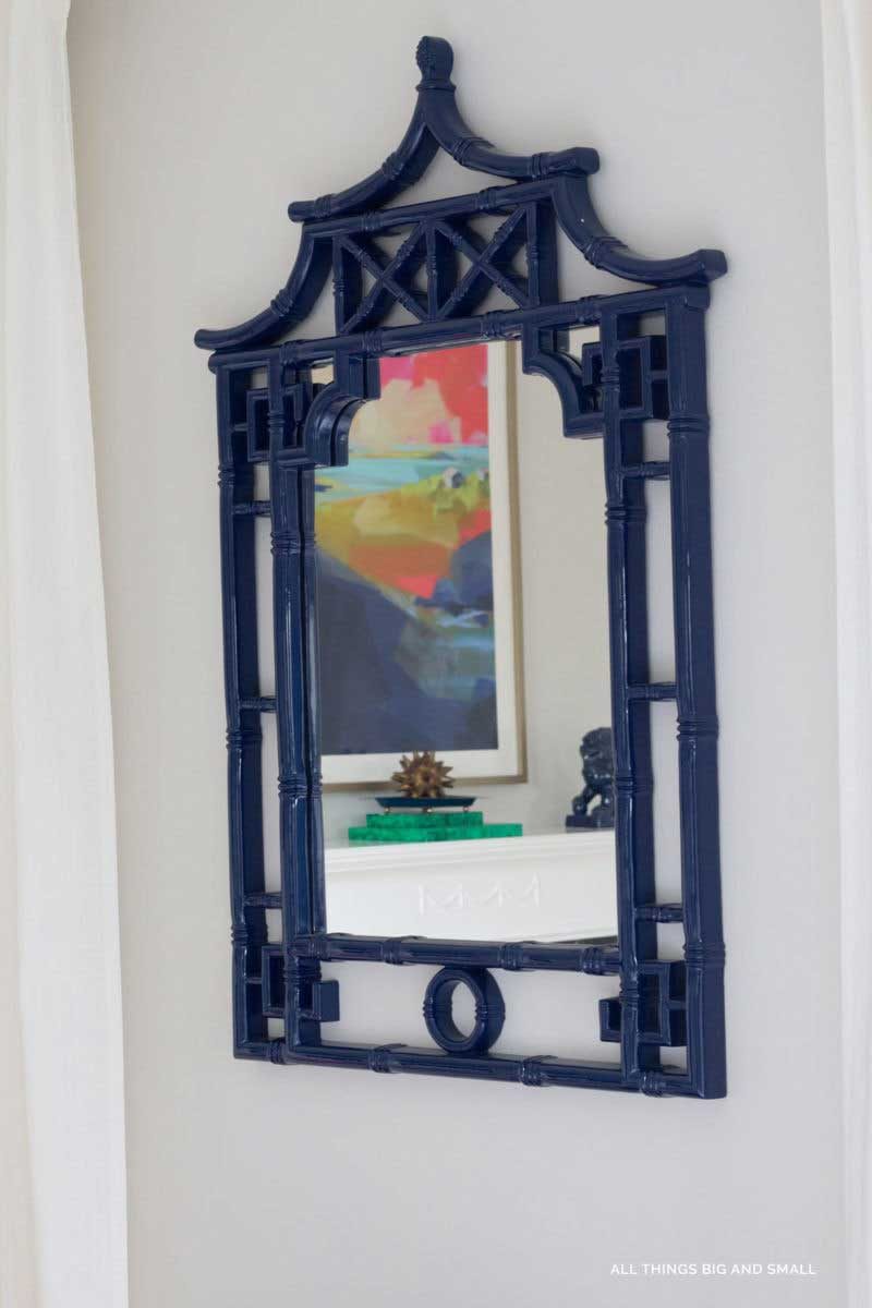 tip to make your bedroom look nice- add mirrors to magnify light